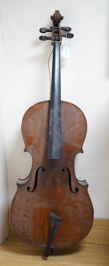 A late 19th century small cello, unsigned and without label inside body, stamped inventory number 769, length of back 62cm. Condition - poor to fair